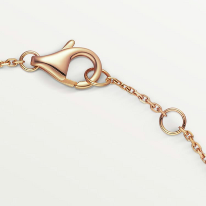 CARTIER CURB CHAIN BLACK ONYX GOLD AMULET