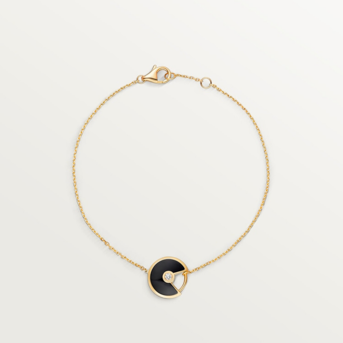 CARTIER CURB CHAIN BLACK ONYX GOLD AMULET