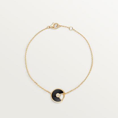 CARTIER CURB CHAIN BLACK ONYX GOLD AMULET