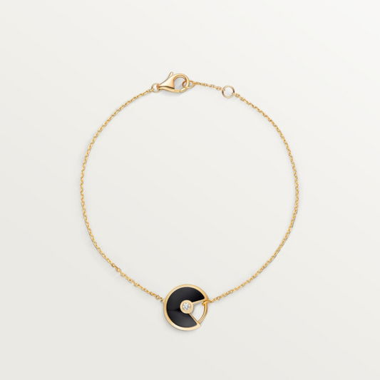 CARTIER CURB CHAIN BLACK ONYX GOLD AMULET